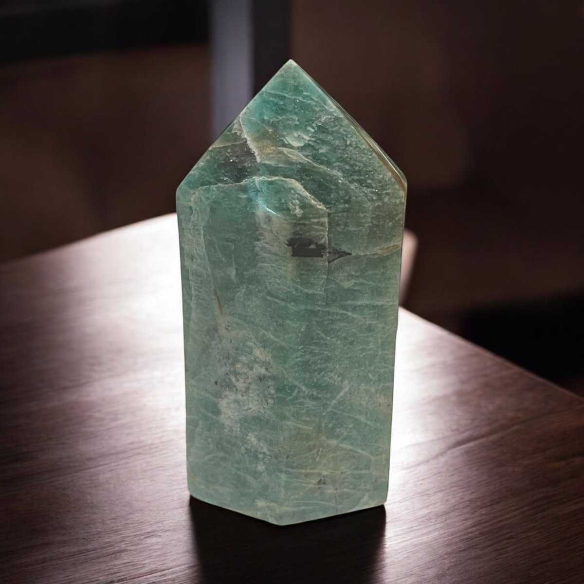 Discover the healing properties of Amazonite, known for emotional balance and effective communication. This blue-green stone promotes heart and throat chakra alignment, alleviating stress and fostering clear expression. Explore our collection of spheres, towers, and tumble stones to enhance your emotional well-being