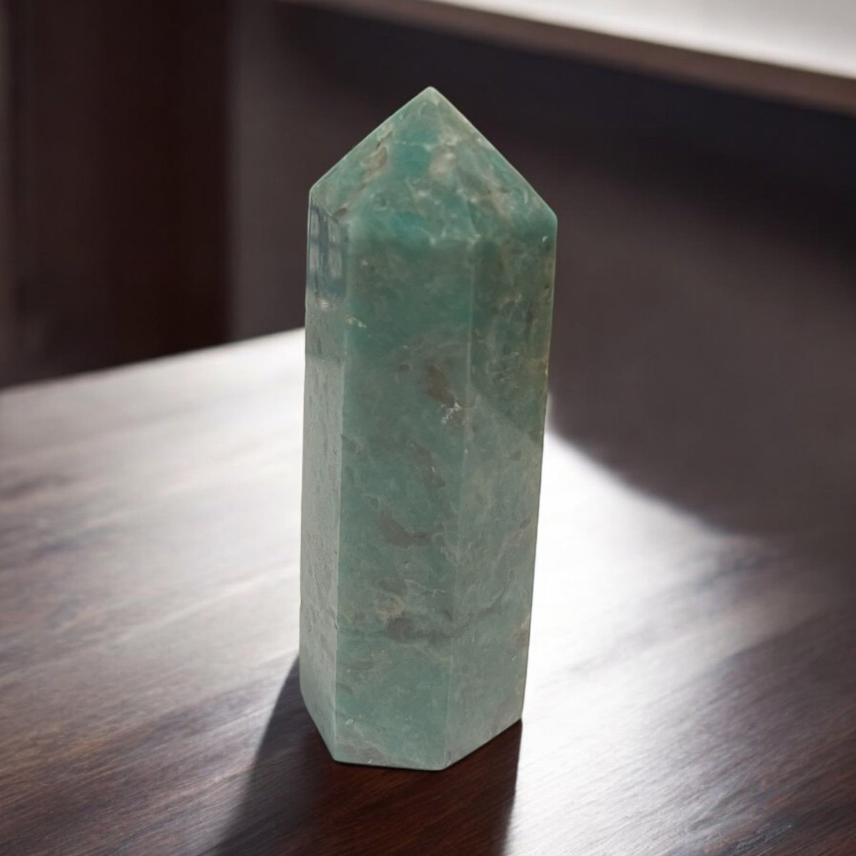 Discover the healing properties of Amazonite, known for emotional balance and effective communication. This blue-green stone promotes heart and throat chakra alignment, alleviating stress and fostering clear expression. Explore our collection of spheres, towers, and tumble stones to enhance your emotional well-being